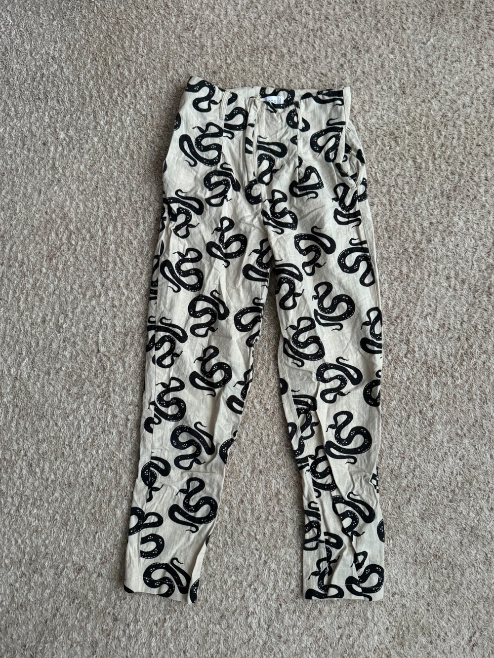 Cream and black snake pants